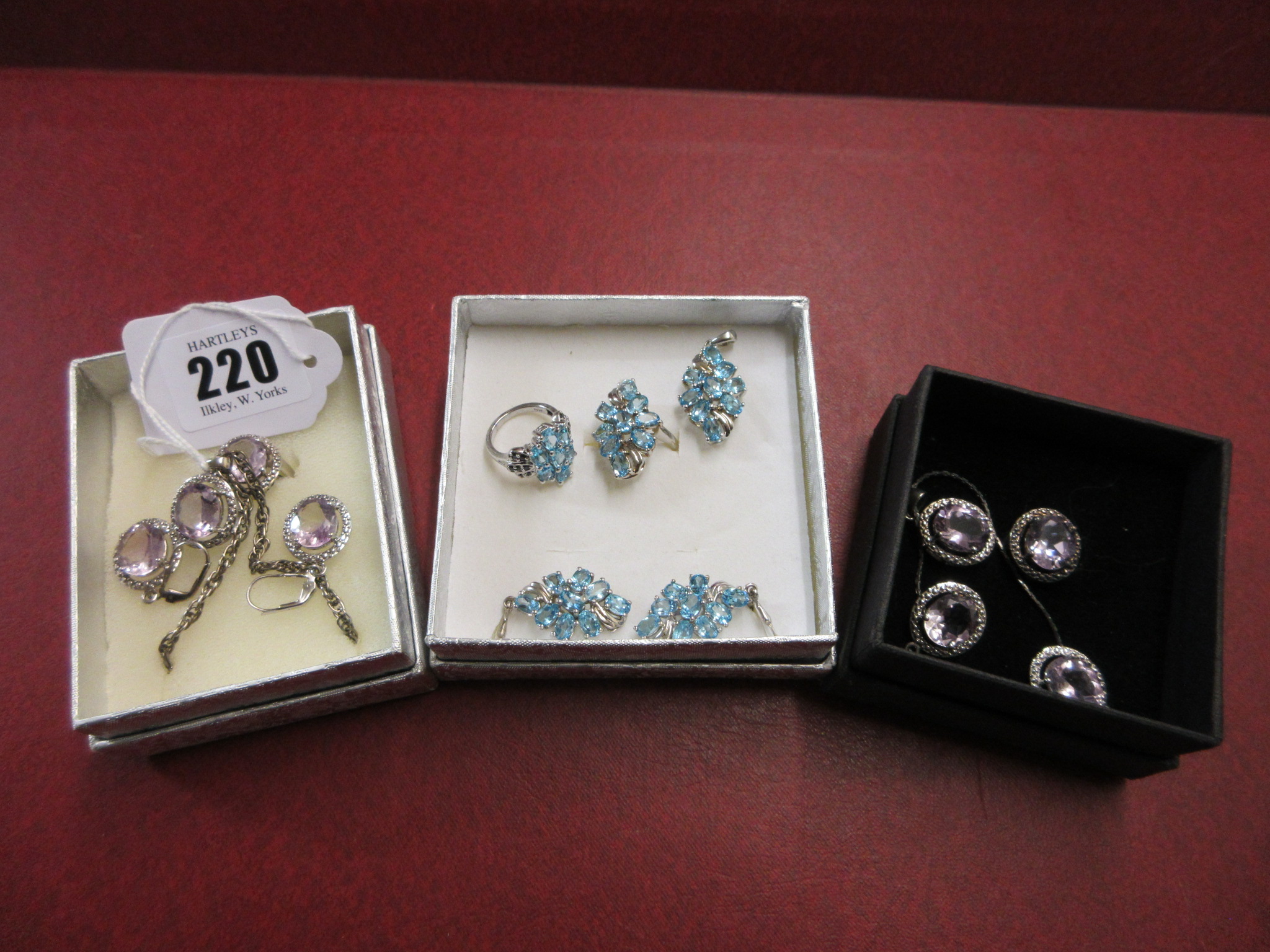 THREE SILVER SUITES OF JEWELLERY Image