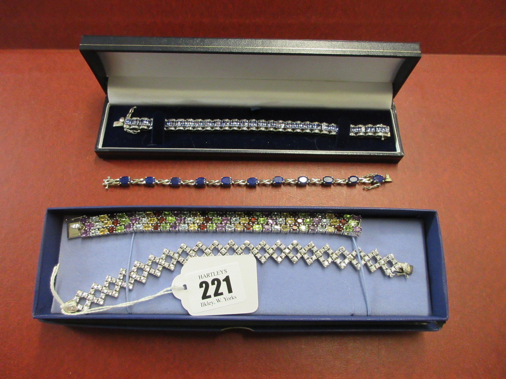 FOUR SILVER BRACELETS Image
