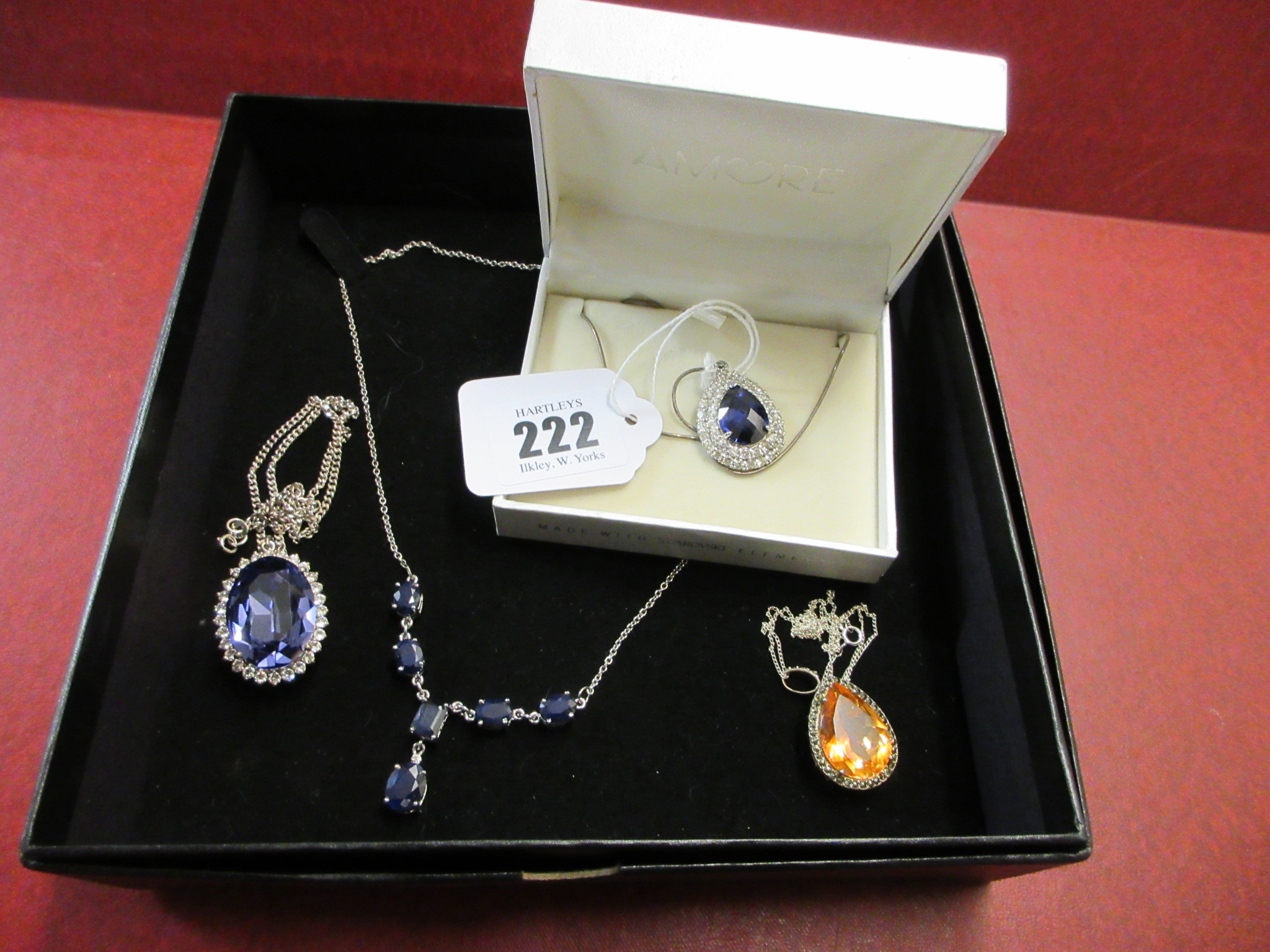 FOUR SILVER NECKLACES Image