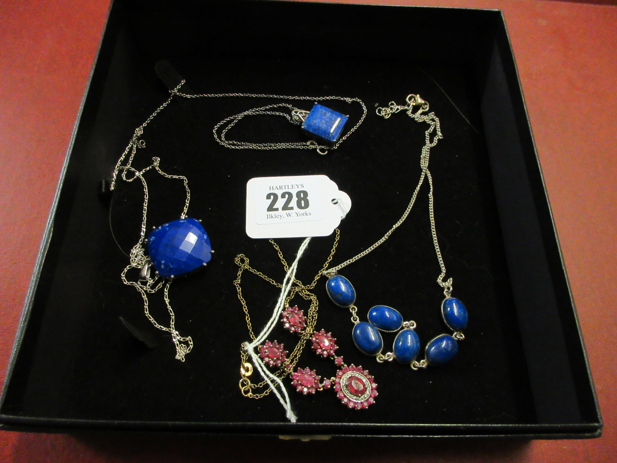 FOUR SILVER NECKLACES Image