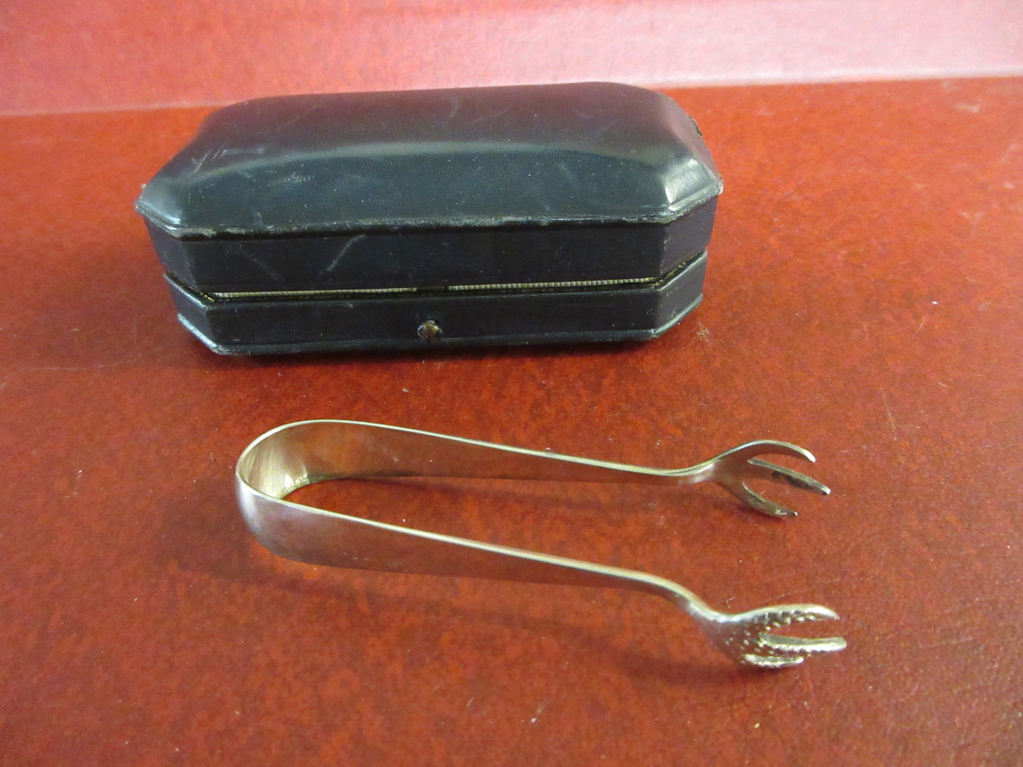CASED PAIR OF SUGAR TONGS Image