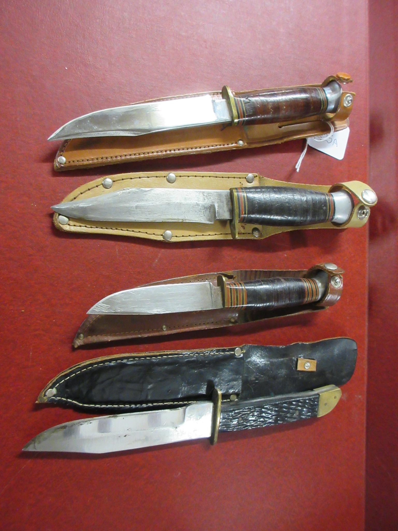 FOUR KNIVES AND SHEATHS Image