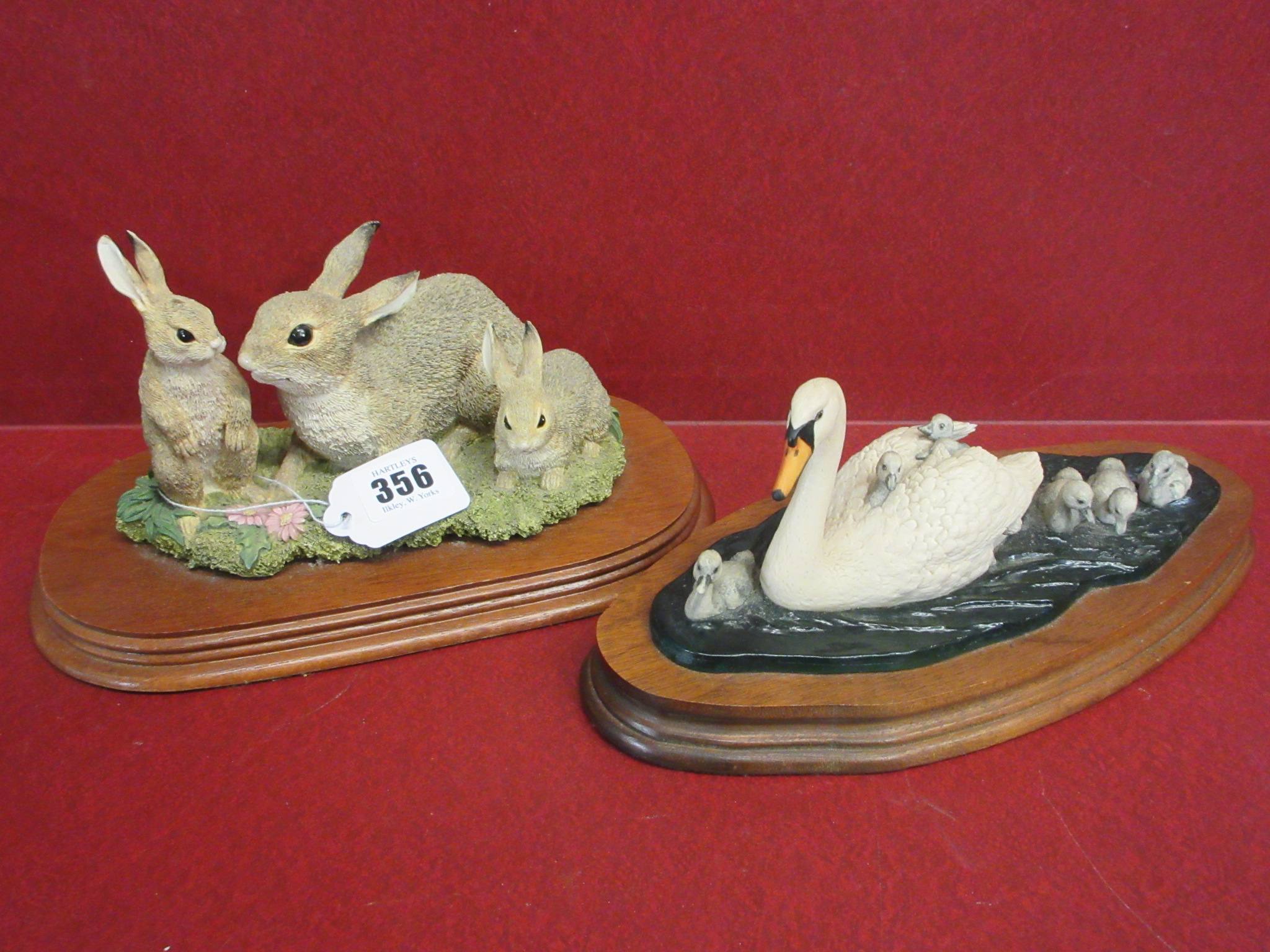 BORDER FINE ARTS SWAN WITH CYGNETS AND LEONARDO THREE RABBITS Image