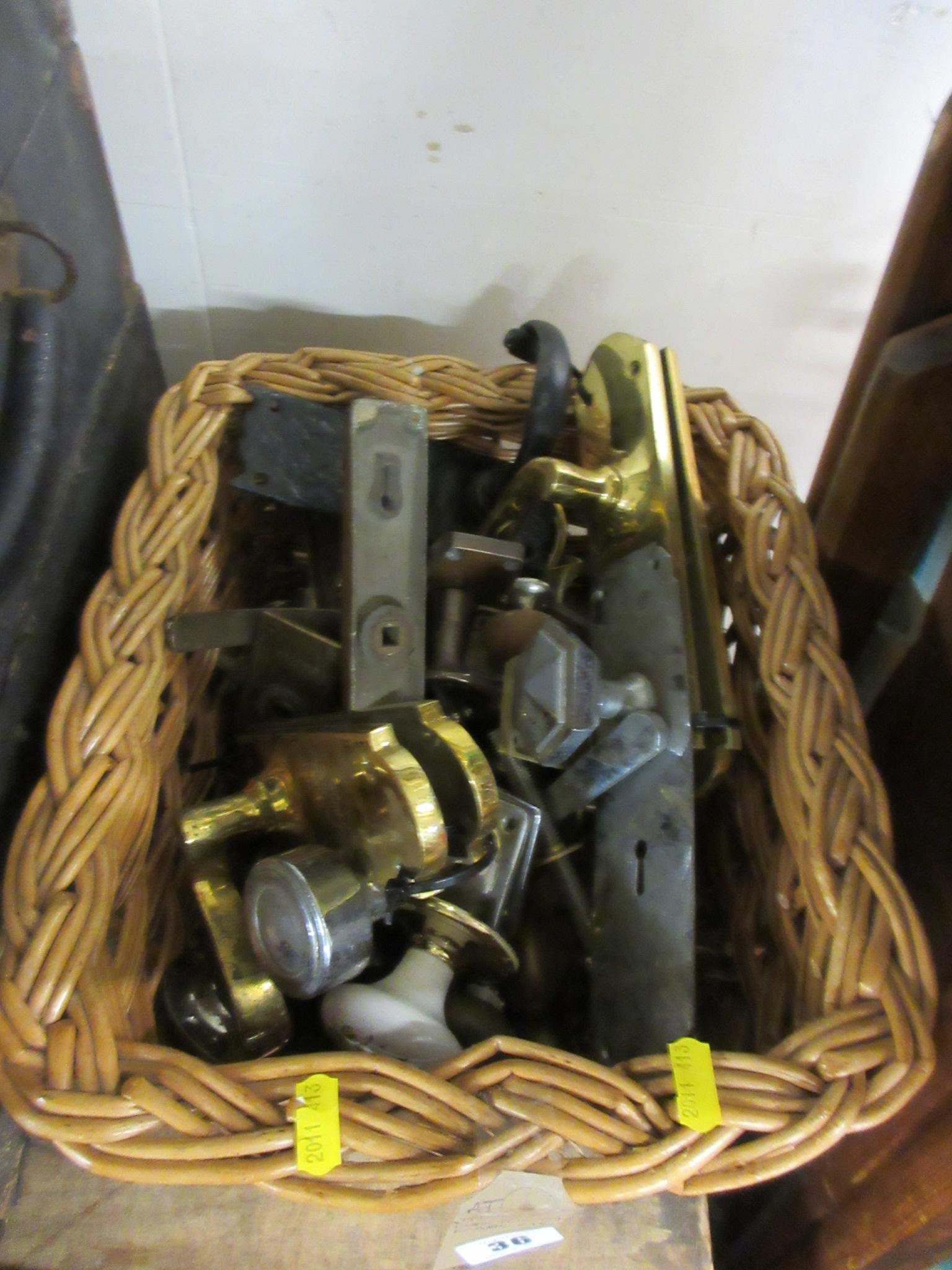 BASKET OF DOOR HANDLES AND KNOBS ETC Image