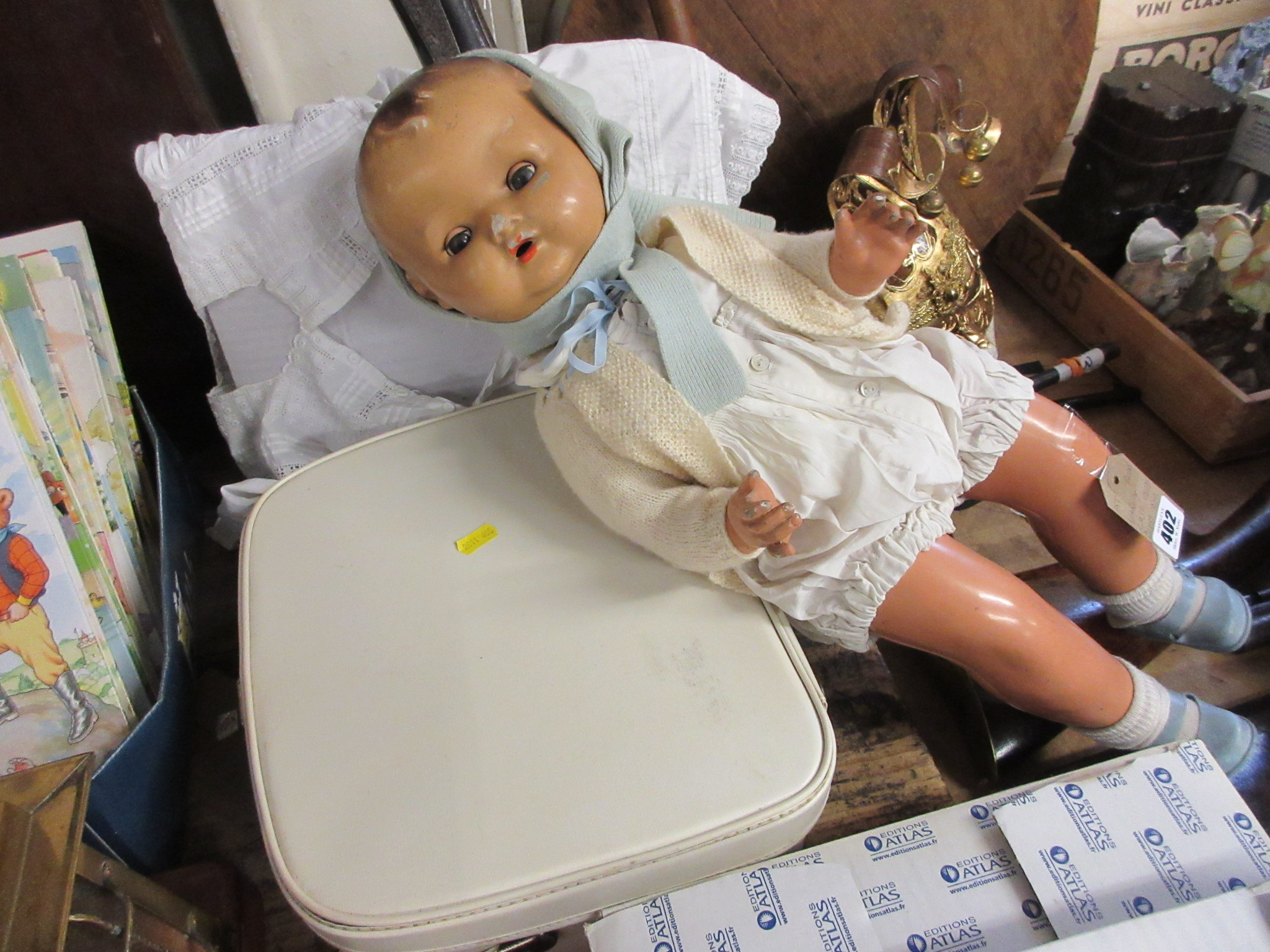 VANITY CASE WITH CHILDS DRESS AND VINTAGE DOLL Image