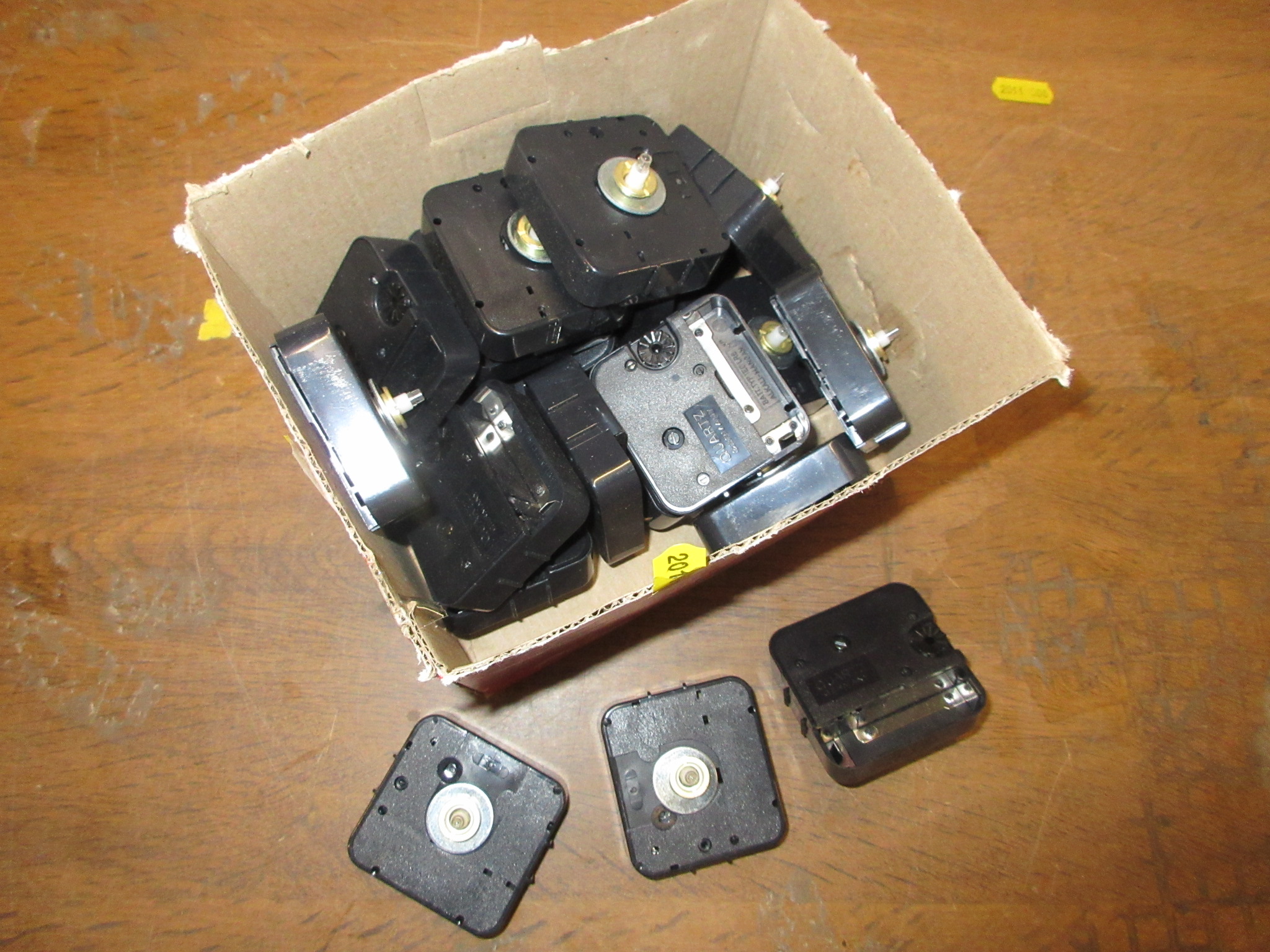BOX OF GERMAN CLOCK MOVEMENTS Image