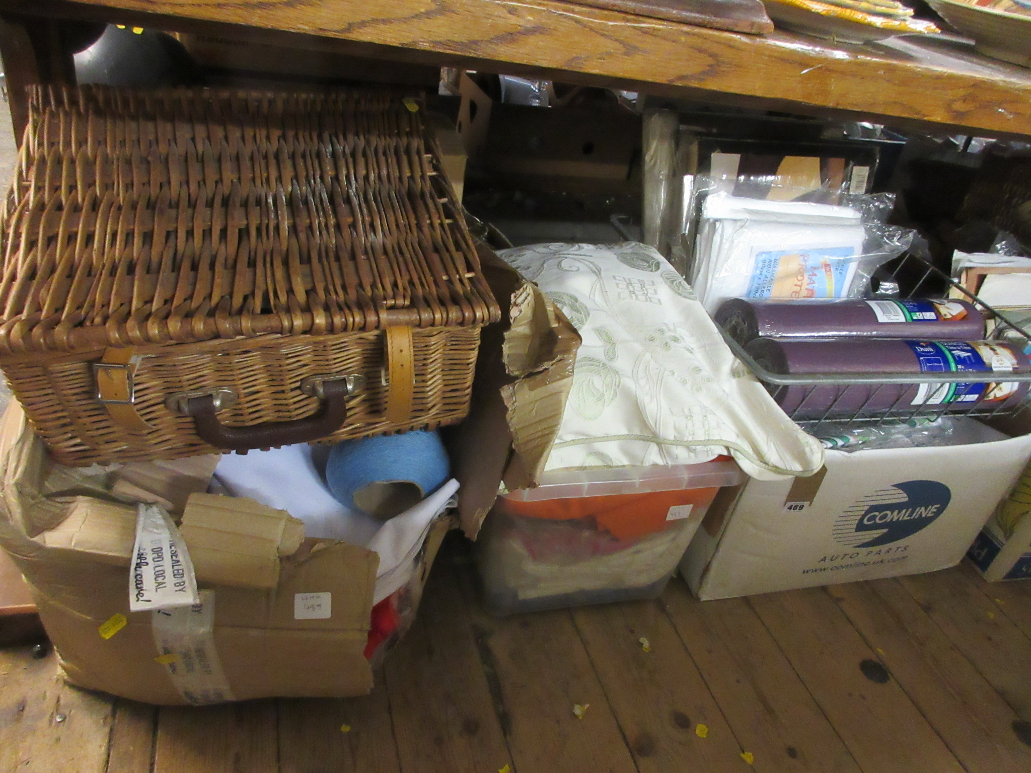 THREE BOXES OF FABRIC AND A WICKER HAMPER Image