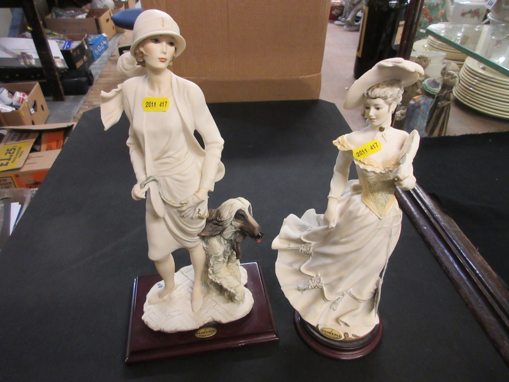 PAIR OF ARMANI FIGURES Image