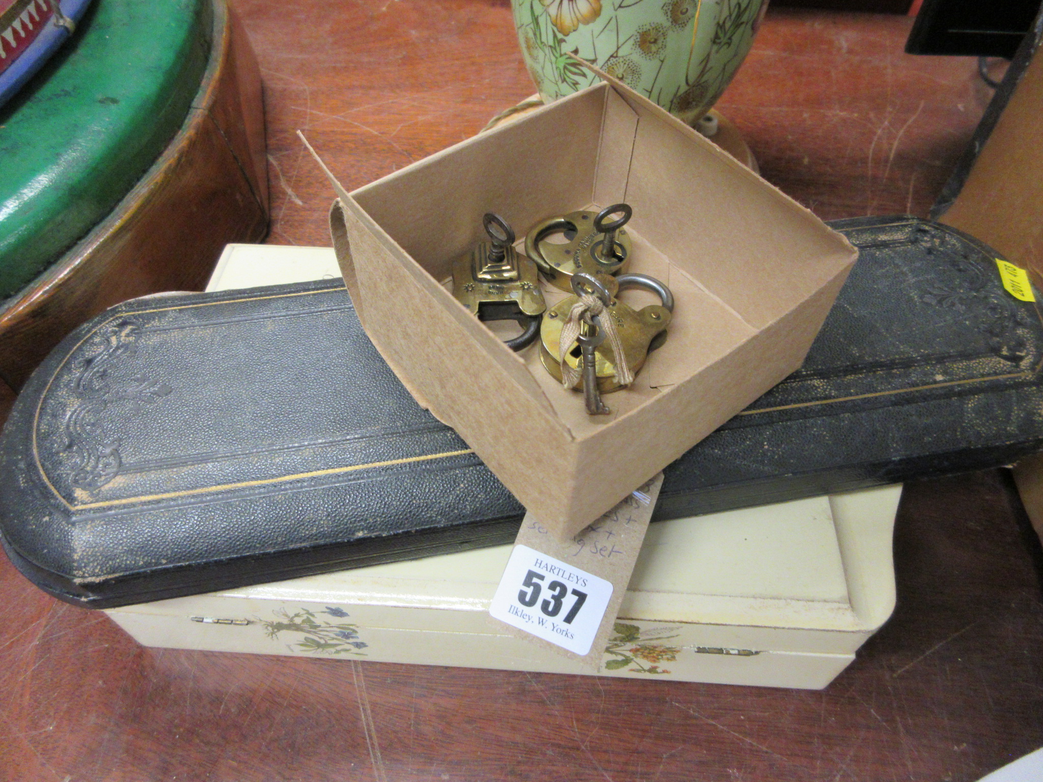 THREE SMALL BRASS PADLOCKS WITH KEY BOX AND SERVING SET Image