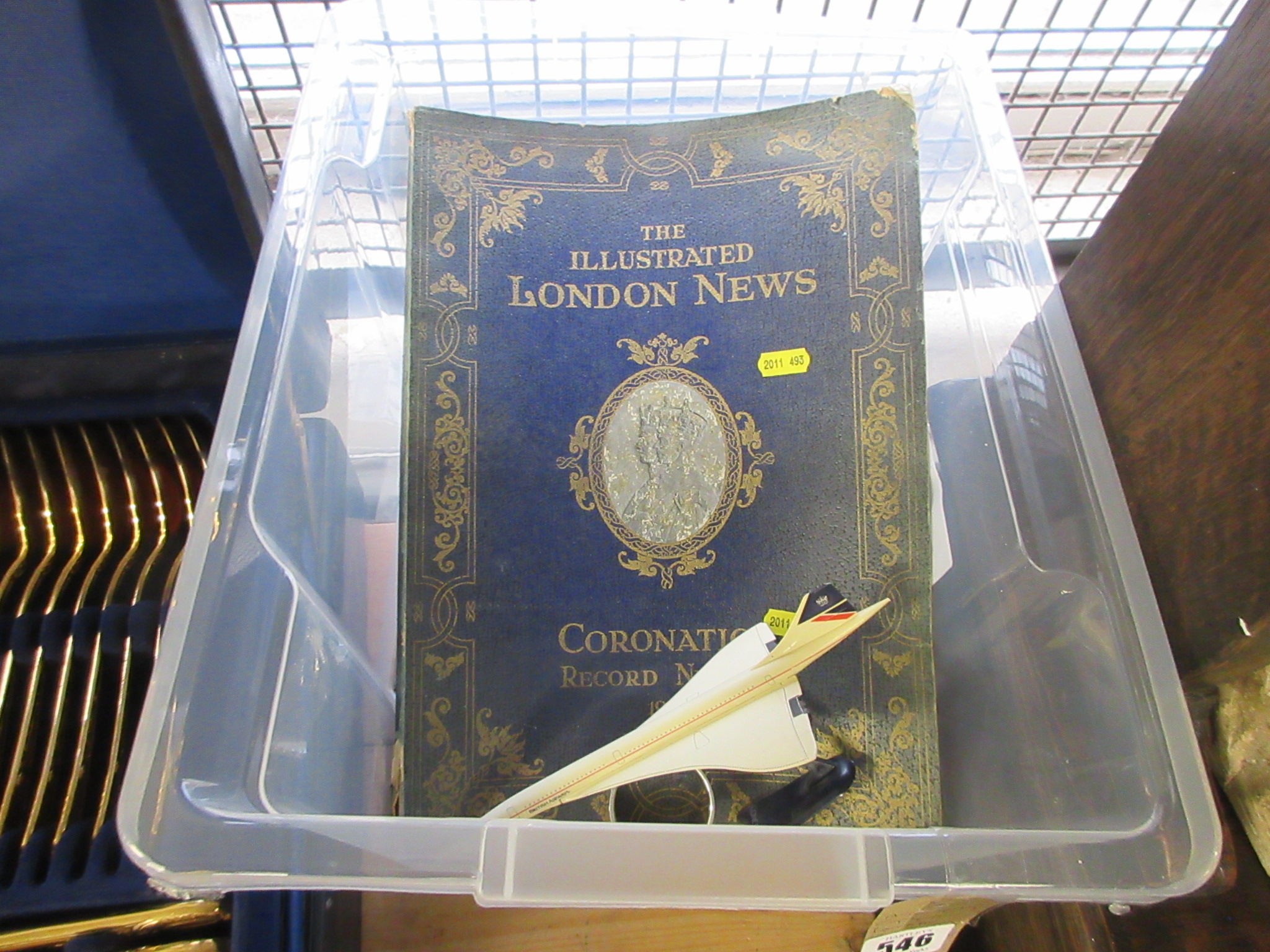 COPY OF THE ILLUSTRATED LONDON NEWS SILVER NAPKIN RING AND A SMALL CONCORDE MODEL Image