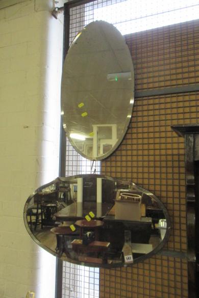 TWO OVAL MIRRORS Image