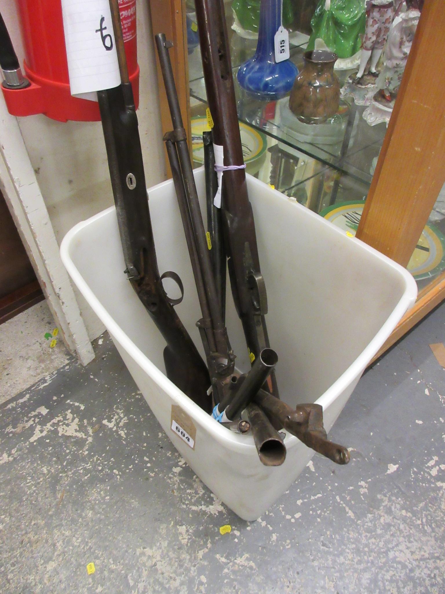 COLLECTION OF SPARE GUN PARTS Image