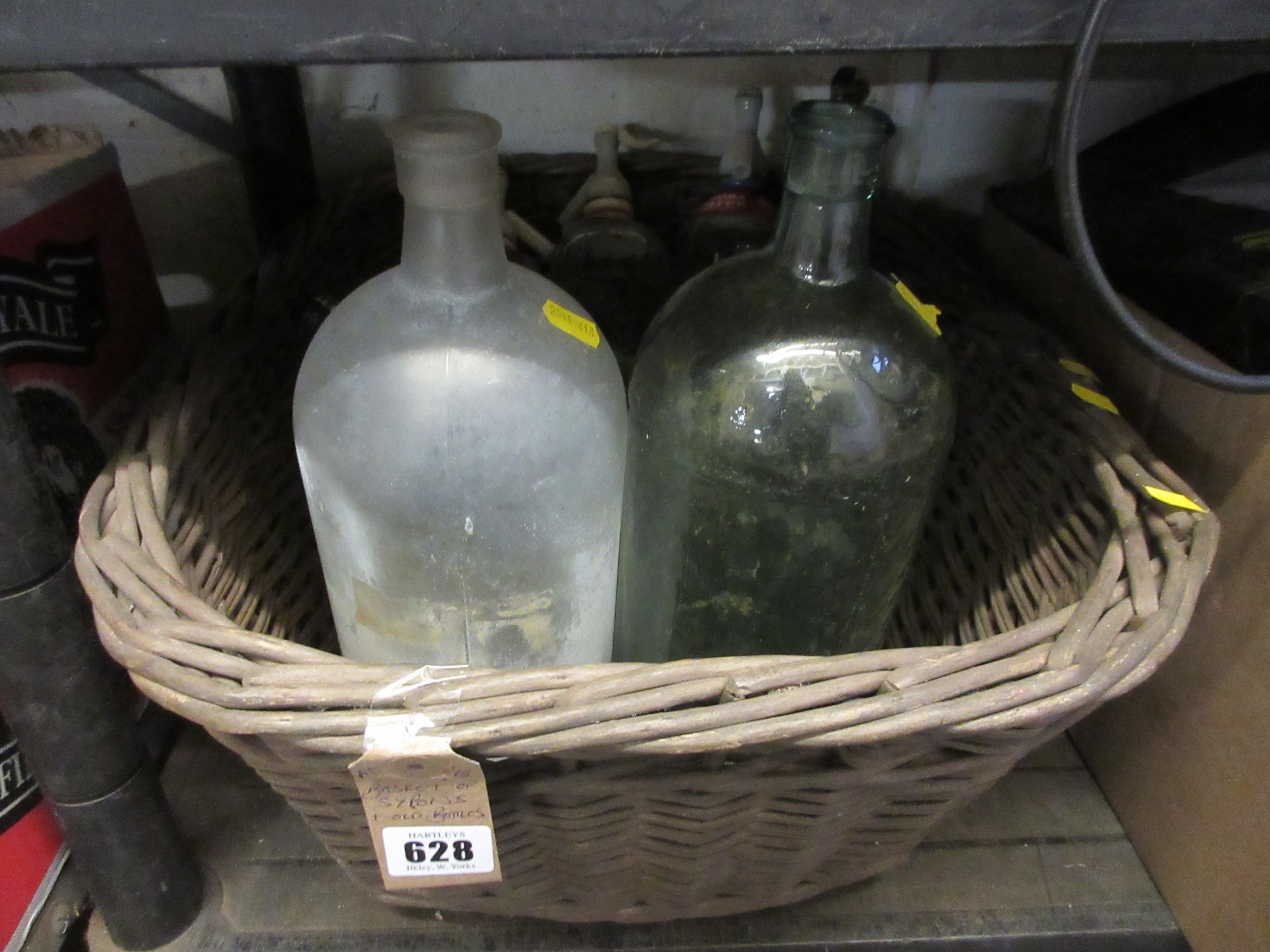 BASKET OF SYPHONS AND OLD BOTTLES Image