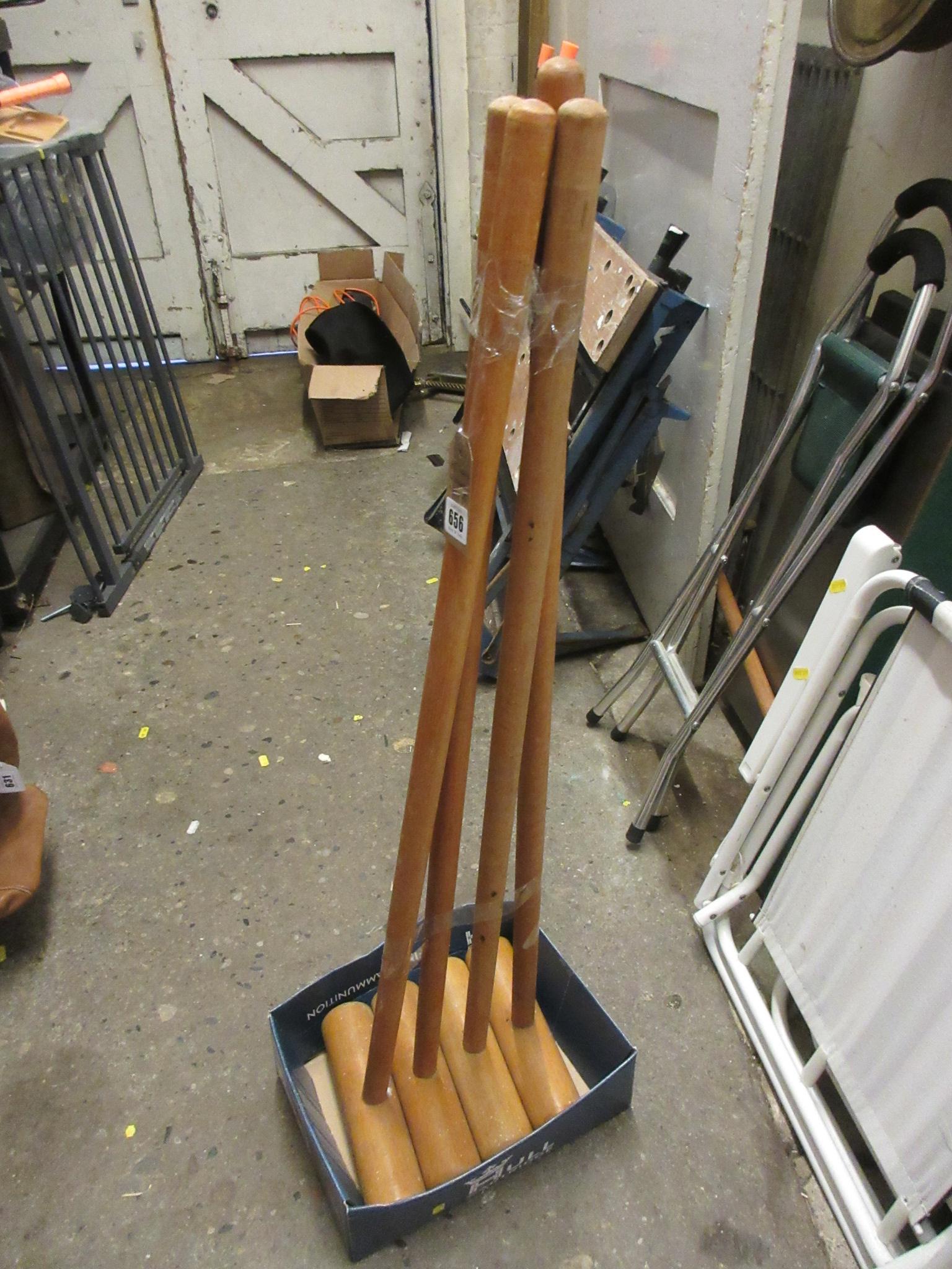FOUR CROQUET MALLETS Image