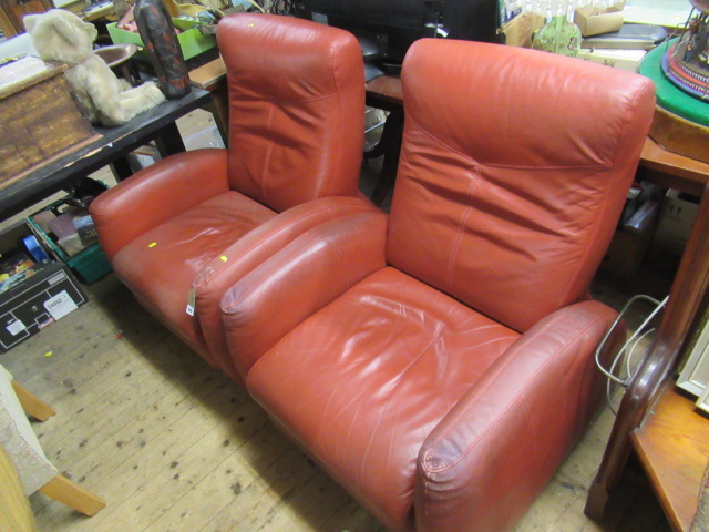 TWO RED LEATHER RECLINING ARMCHAIRS Image