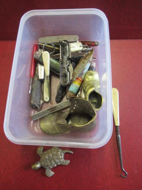 TUB OF PEN KNIVES AND ITEMS OF BRASS Image