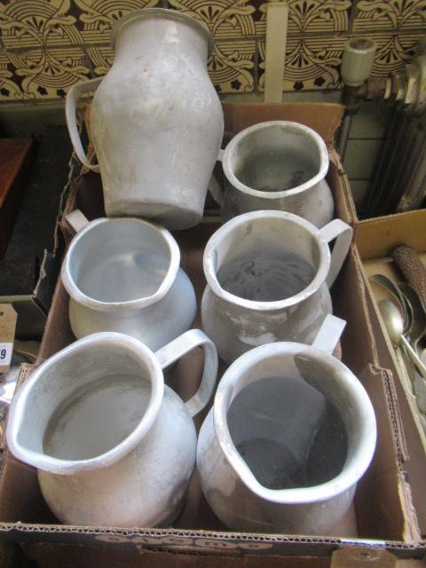 SIX ALUMINIUM MEASURING JUGS Image