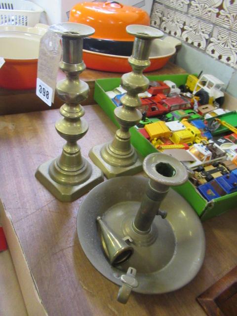 PAIR OF BRASS CANDLE HOLDERS AND A CHAMBER STICK Image