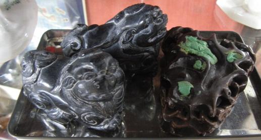 TWO CARVED HARD STONE TEMPLE DOGS AND STAND Image