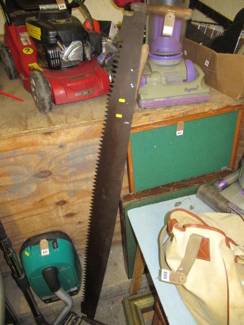 LARGE SAW AND A HOE Image