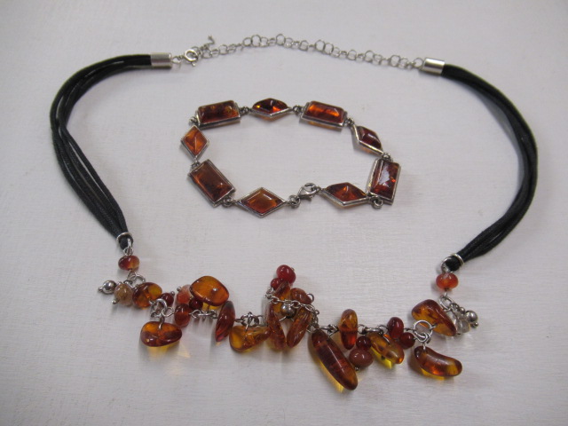 SILVER AND AMBER NECKLACE AND A BRACELET Image
