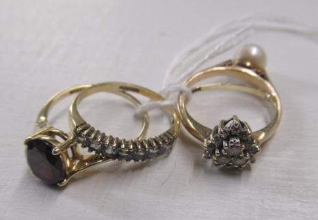 FOUR 9CT GOLD GEM SET RINGS Image