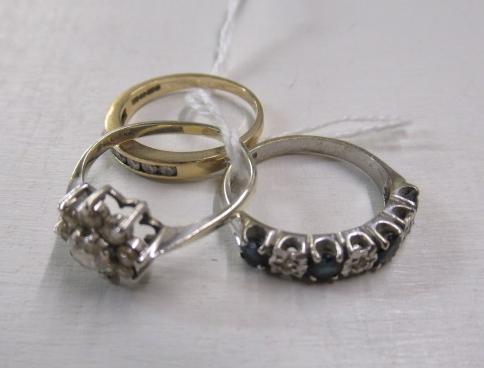 THREE 9CT GOLD GEM SET RINGS Image