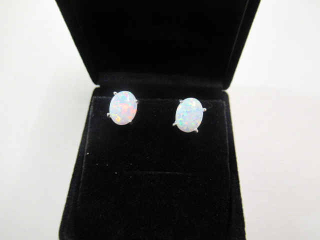 PAIR OF SILVER AND OPAL EARRINGS Image