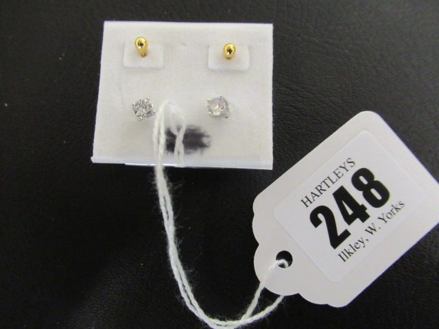 PAIR OF 9K GOLD EAR STUDS AND PAIR OF SILVER STUDS Image