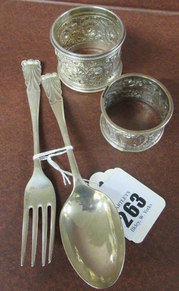 TWO SILVER NAPKIN RINGS AND TWO PIECE CHRISTENING SET Image