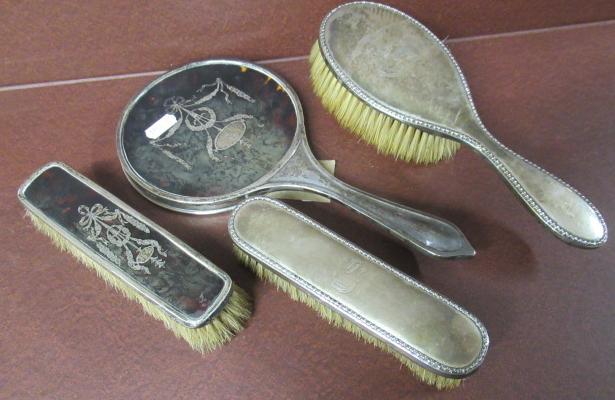 SILVER HAND MIRROR AND THREE BRUSHES Image