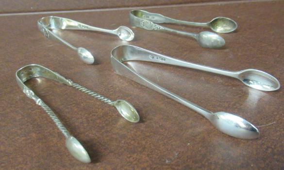 FOUR PAIRS OF SILVER SUGAR TONGS Image