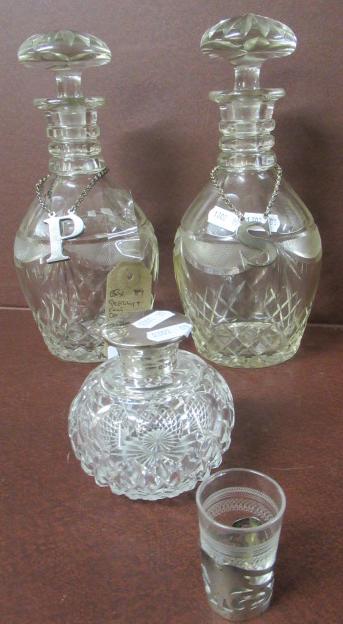 SHERRY AND PORT DECANTERS WITH SILVER LABELS SILVER TOPPED BOTTLE AND ANOTHER Image