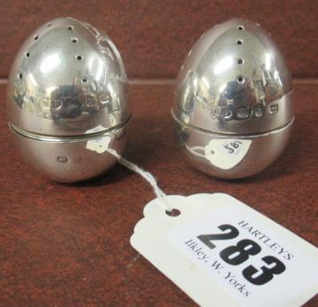 PAIR OF WEIGHTED SILVER EGG PEPPERETTES Image