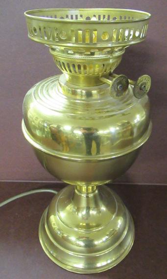 COPPER KETTLE AND BRASS LAMP Image