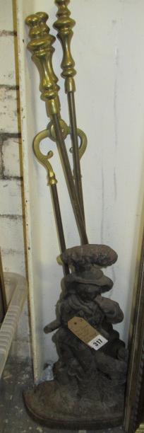 IRON FIGURAL DOORSTOP AND FIRE IRONS Image