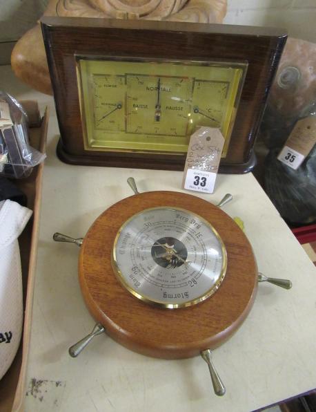 TWO WOOD CASED BAROMETERS Image