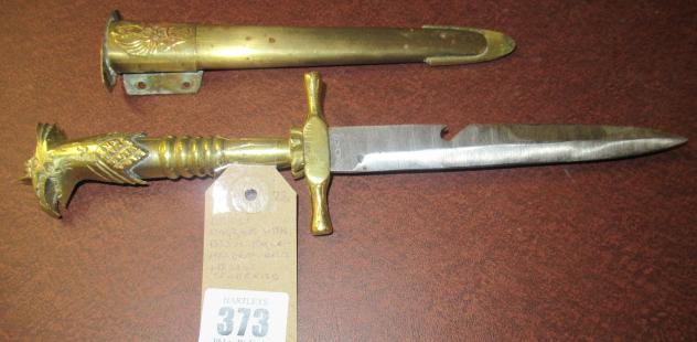 DRESS DAGGER WITH BRASS EAGLE HEADED HILT IN BRASS SCABBARD Image