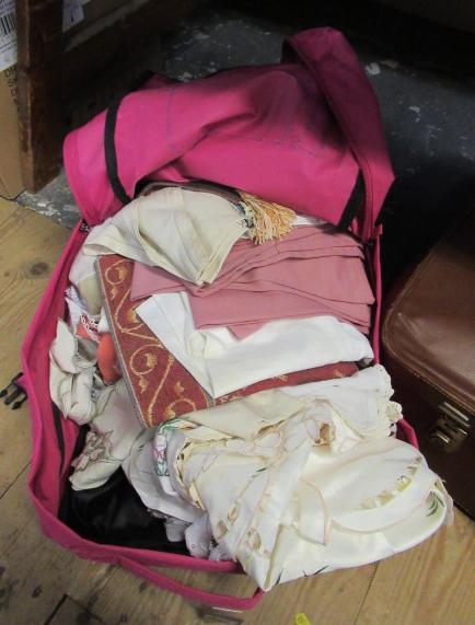 PULL ALONG SUITCASE AND CONTENTS Image