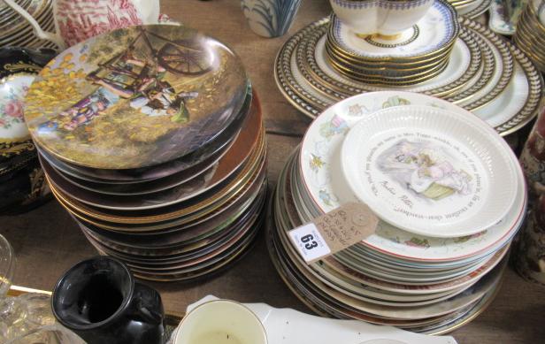 TWO STACKS OF COLLECTABLE PLATES Image