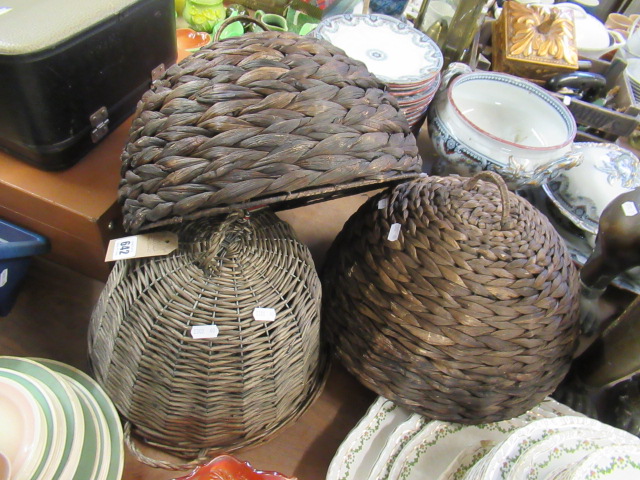 THREE WICKER FOOD COVERS Image