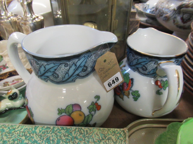 TWO GRADUATED JUGS Image