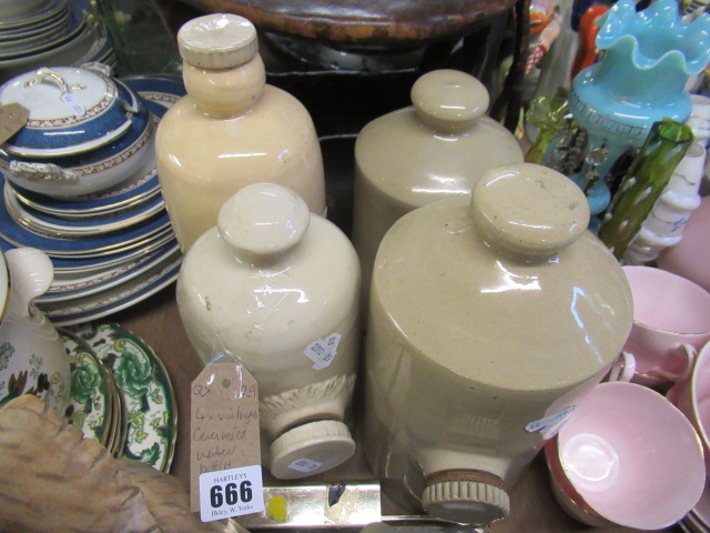 FOUR VINTAGE STONEWARE BOTTLES Image