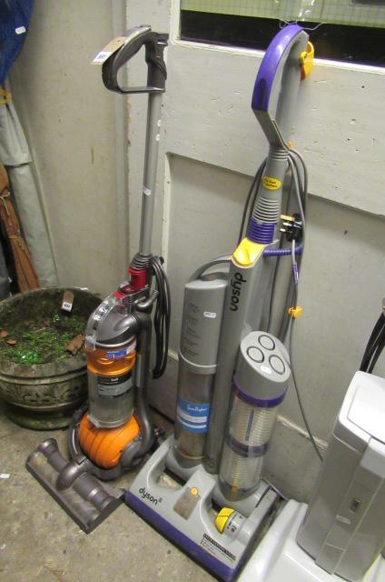 TWO DYSON VACUUM CLEANERS Image