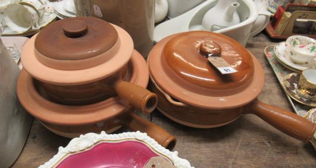 THREE STONEWARE COOKING POTS Image