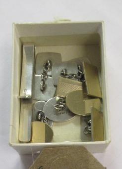 THREE PAIRS OF SILVER AND GOLD CUFF LINKS AND A TIE CLIP Image