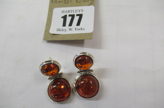 PAIR OF SILVER AND AMBER EARRINGS Image