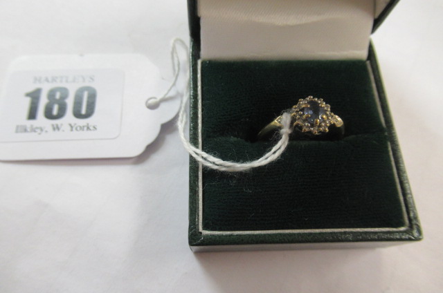 9CT GOLD BLUE STONE AND DIAMOND RING Image
