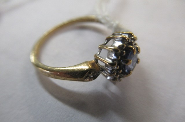 9CT GOLD BLUE STONE AND DIAMOND RING Image