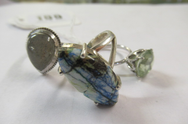 THREE SILVER RINGS Image